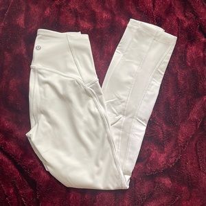 brand new lululemon white leggings without tags size 2 mesh design and pockets